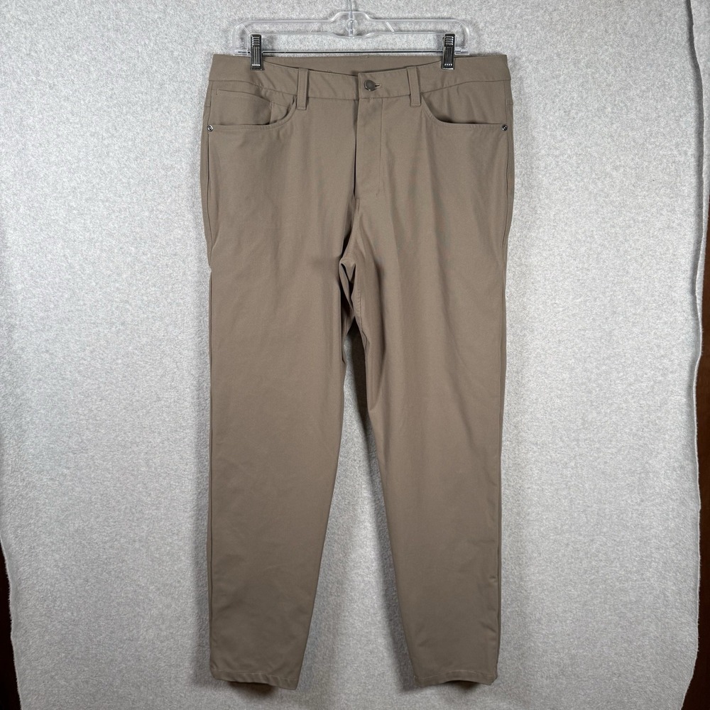 Lululemon ABC slim fit pants mens 34 x 29 beige khaki athletic work golf